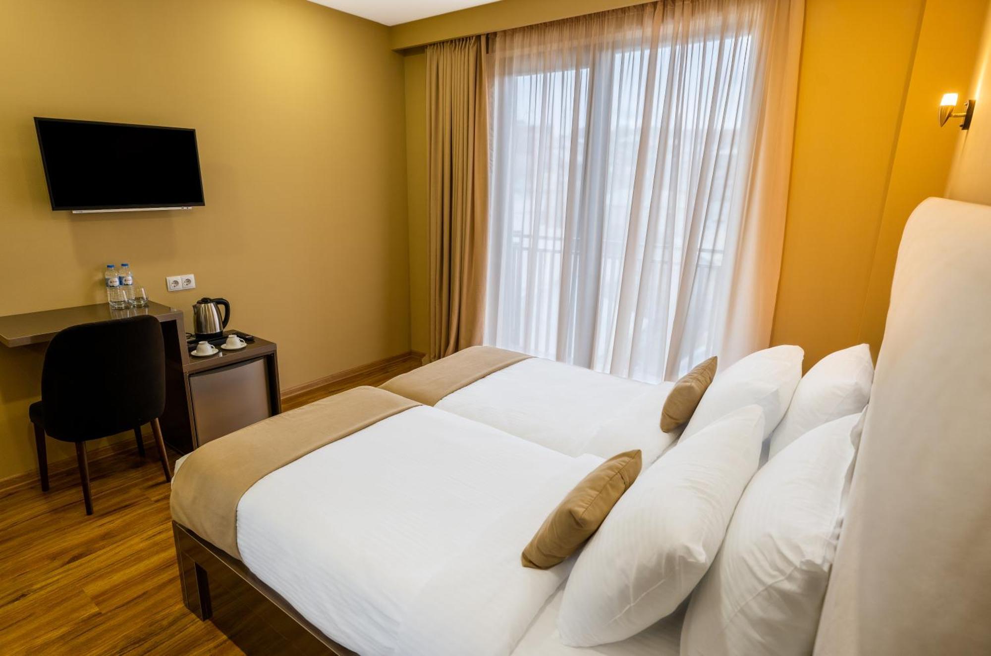 Hotel Residence Plaza Tiflis Oda fotoğraf